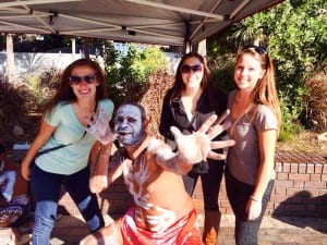 Alexis Dorris is shown on far left with an Aboriginal Australian in Sydney.
