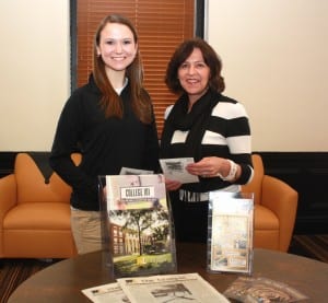 From left, student ambassador Jillian Laslo and Admissions Director Brenda King discuss the March 28 Open House.