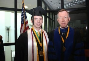 Graduating speaker Samuel Miller and Interim President Dr. John McCullough.