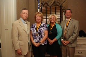 Medallions were presented to 25-Year employees by Interim President Dr. John P. McCullough, from left McCullough, 
