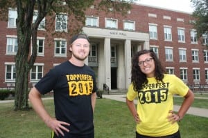 Graduate student Luke Takosik and senior Hannah Walters are ready to greet students. 