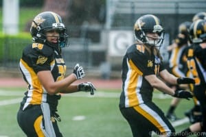 Wearing the black and gold of the Pittsburgh Passion, WLU student Rosie Christian is proud to be a member of the IWFL.