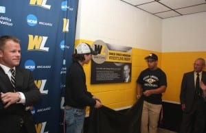 The unveiling of the plaque for the Coach Monseau Wrestling Room, 
