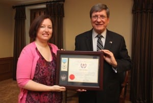 Sara Sweeney was pleasantly surprised by the special presentation of a Civilian Award by President Stephen Greiner.