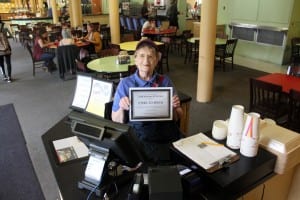 Ethel Scherich displays her award for Staff of the Year.
