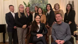 Pictured sitting: Dr. Nicole Ennis and Dr. Richard L. Whitehead. Pictured standing from the left are doctoral students: Justin Zimmerman, Megan White, Brittney Sobota, Shawna Safreed, Michalene Mills, Sydney Wagstaff, Sara Price, and Denise Miller. (Not pictured: Melissa Henry, Mitchell Moon, and Ken Parker).