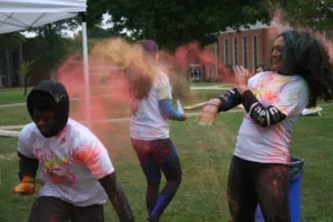 Students throw color